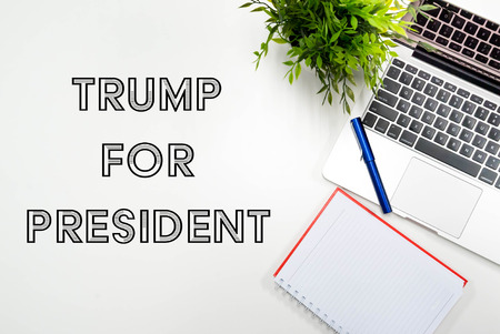 Kuala Lumpur, Malaysia - November 9, 2016: Word Trump For President with flat lay office concept background. Donald trump is the new United States President and Republican candidate for the 2016 presidential electionのeditorial素材