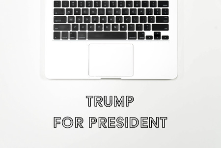Kuala Lumpur, Malaysia - November 9, 2016: Word Trump For President with flat lay office concept background. Donald trump is the new United States President and Republican candidate for the 2016 presidential electionのeditorial素材