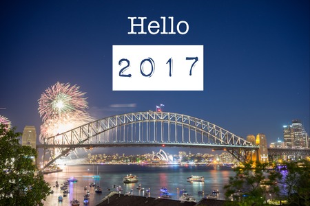 Happy New Year Holiday Hello 2017 Sydney concept with fireworks display at Sydney Harbour as a backgroundの写真素材