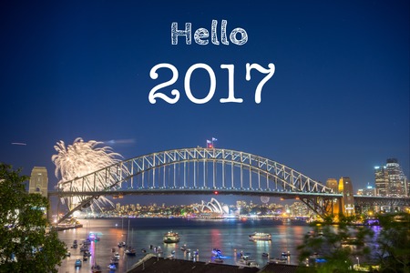 Happy New Year Holiday Hello 2017 Sydney concept with fireworks display at Sydney Harbour as a backgroundの写真素材