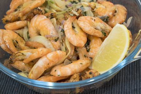Boiled fried prawn in a bowl on a table. Close upの写真素材