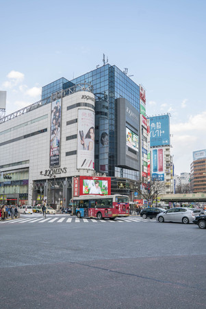 Tokyo, Japan - April 3, 2017: Pedestrians cross at Shibuya Crossing. It is one of the world's most famous and claim to be a busiest scramble crosswalks.のeditorial素材