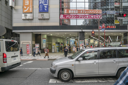 Tokyo, Japan - April 3, 2017: Pedestrians cross at Shibuya Crossing. It is one of the world's most famous and claim to be a busiest scramble crosswalks.のeditorial素材