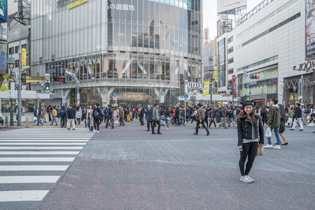 Tokyo, Japan - April 3, 2017: Pedestrians cross at Shibuya Crossing. It is one of the world's most famous and claim to be a busiest scramble crosswalks.のeditorial素材