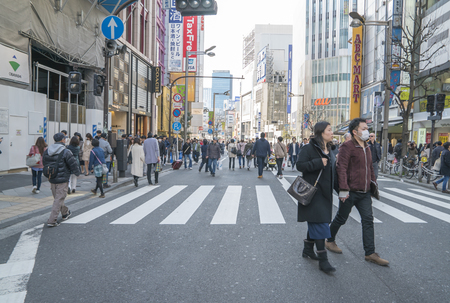 Shinjuku, Tokyo, Japan - April 02, 2017: Japanese and tourists walking and shopping at Shinjuku (large entertainment, business and shopping area around Shinjuku Station)のeditorial素材