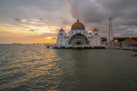 Beautiful sunset over the mosque, Malacca Straits Floating Mosque (Masjid Selat Melaka).の写真素材