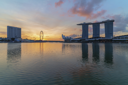 Singapore landmark city skyline at the Marina bay during sunrise.のeditorial素材