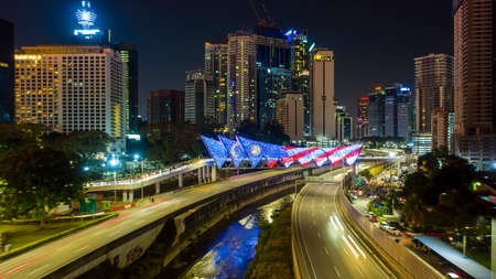 Kuala Lumpur, Malaysia - February 22, 2020 : Aerial drone view of newly opened pedestrian bridge Saloma Link connecting Kampung Baru with Ampang road.のeditorial素材