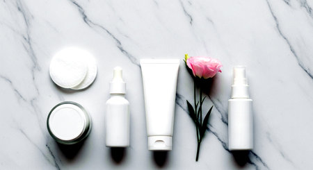 Cosmetics on a white marble background. Flat lay, top viewの素材