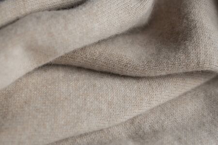 folds of beige woolの写真素材