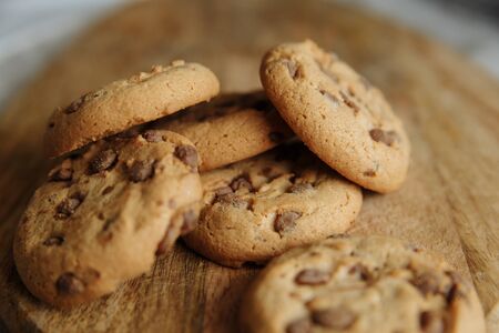 brown seven cookies on the wooden board backgroundの写真素材