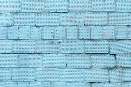 Blue, old, full-screen brick wall.の写真素材