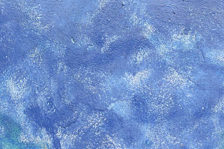 Rough blue wall full screen.