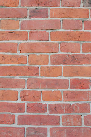Red brick wall full screen.