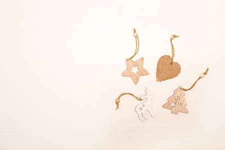 There are many different Christmas tree decorations on the background in full screen.