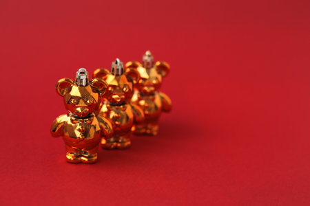 Bright, festive Christmas decorations on a red background in full screen.の写真素材