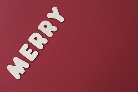 Bright, festive Christmas decorations on a red background in full screen.の写真素材