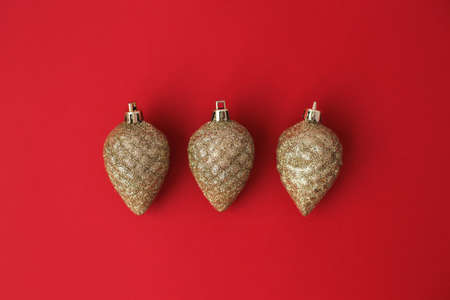 Bright, festive Christmas decorations on a red background in full screen.の写真素材