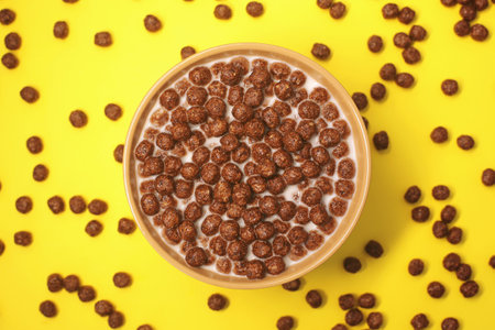 Chocolate cereal balls for breakfast. Lie on a bright, even background.の写真素材