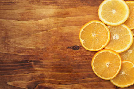 Lots of juicy, tasty, ripe oranges on a bright, even surface.
