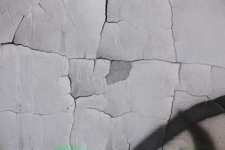 Stone, old, shabby wall, with corrosion and defects in full screen.