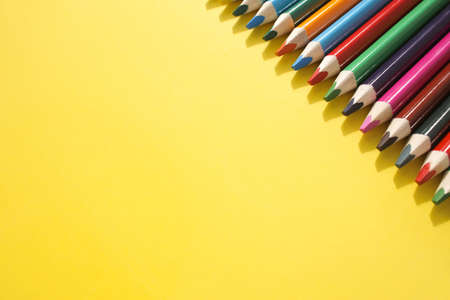 A lot of bright, colored, beautiful pencils on a bright and colorful background.