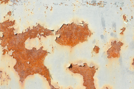 Iron, colored and rusty texture. Shabby metal surface in full screen.の写真素材
