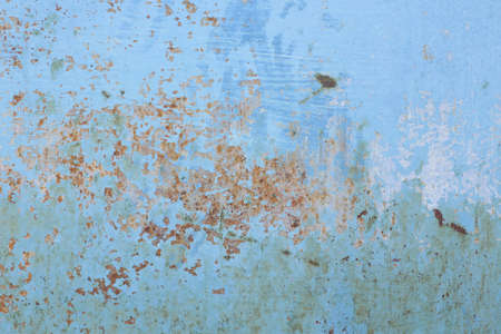 Iron, colored and rusty texture. Shabby metal surface in full screen.の写真素材