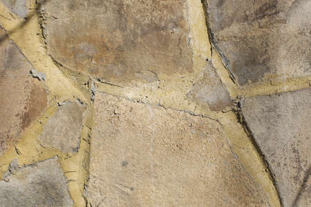 Old, sloppy, stone surface in the whole era. close photographed.