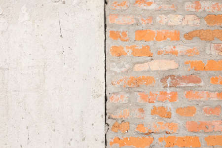 Brick, old, shabby wall in full screen. Wall with bumps and cement.