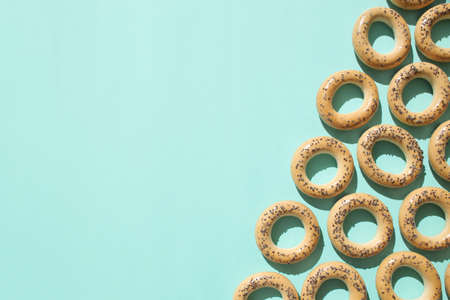 Sweet, delicious, freshly baked donuts on a bright and colorful background.