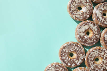 Sweet, delicious, freshly baked donuts on a bright and colorful background.の写真素材