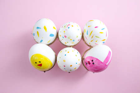 Festive, Easter eggs. White, decorated with drawings on a bright, light background.