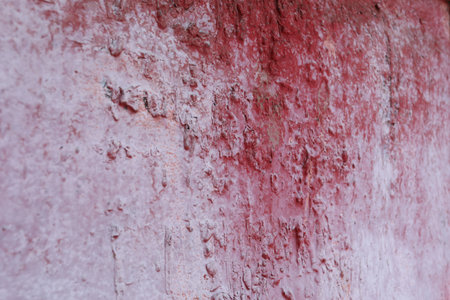 Iron, rusty texture. An old piece of iron, stained paint on the wall.の写真素材