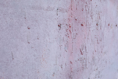 Iron, rusty texture. An old piece of iron, stained paint on the wall.