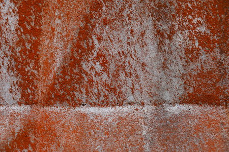 An old wall, shabby, with stains all over the screen.