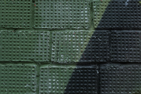 An old wall, shabby, with stains all over the screen.