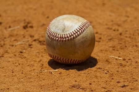  Baseball lying in a fieldの写真素材