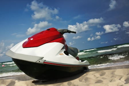 Jet-ski lies on the shoreの写真素材
