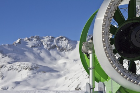 Closeup picture of an  idle snowcannon in the alpsの写真素材