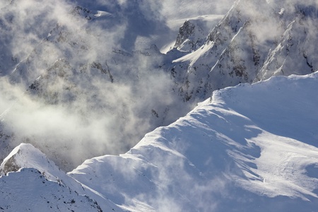 Cloudy summit  of the austrian alps