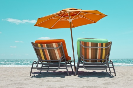 Empty sunbeds with parasol in Miami Beachの写真素材