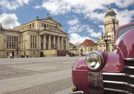  Gendarmenmarkt in Berlin with an oldtimer in the foregroundのeditorial素材