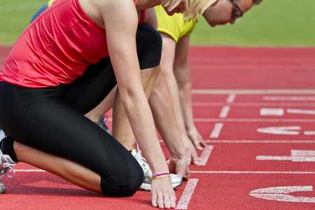 Runner couple in start position