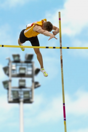 Pole vault over the barの写真素材