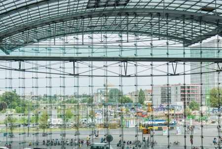 BERLIN, GERMANY- AUGUST 10, 2013: Glass  facade of the city  main railway station . The Hauptbahnhof is the largest train  station in Europe.のeditorial素材