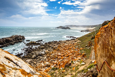 Tremendous Robbberg nature reserve coastline at Plettenberg bay South Africa. The photo shows a part of the loop trail with guide rope.の写真素材