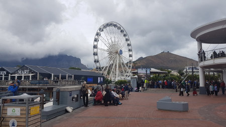 CAPE TOWN, SOUTH AFRICA- NOVEMBER 22, 2017: View of the harbor with ferris wheelのeditorial素材