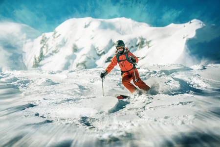 Female skiers action skiing in deep snowの写真素材