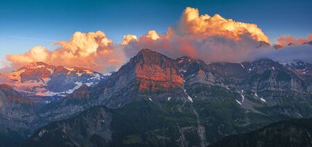 Impressive sundown at the Dents du Midi mountain massif Portes du Soleil in Switzerlandの写真素材